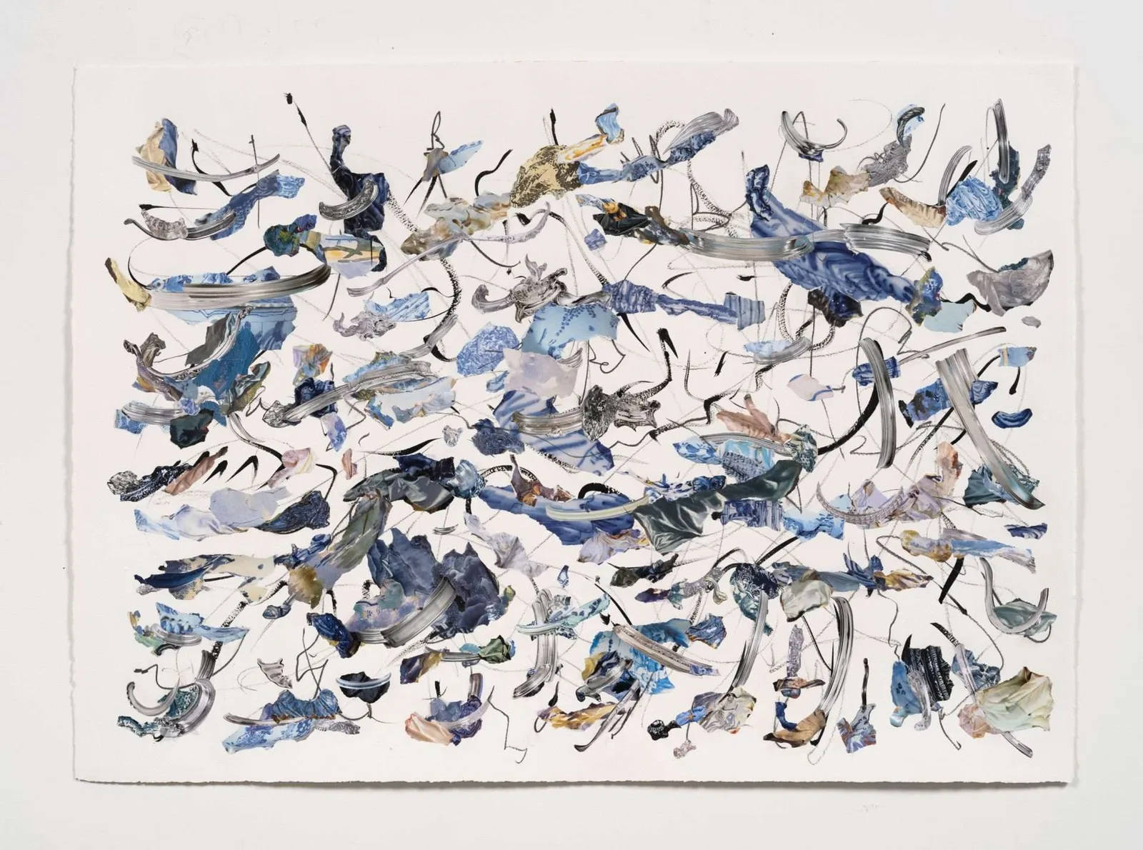 An abstract collage of torn paper strokes in deep blues with flashes of pink