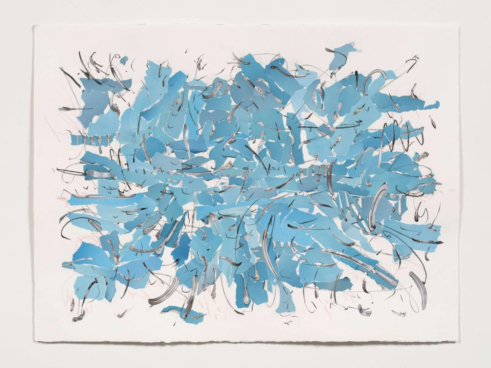 An abstract collage of torn paper in turquoise and silvery grays